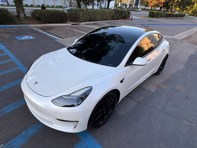 tesla model 3 2021 5YJ3E1EA7MF877954 image tesla model 3 2021 5YJ3E1EA7MF877954 image